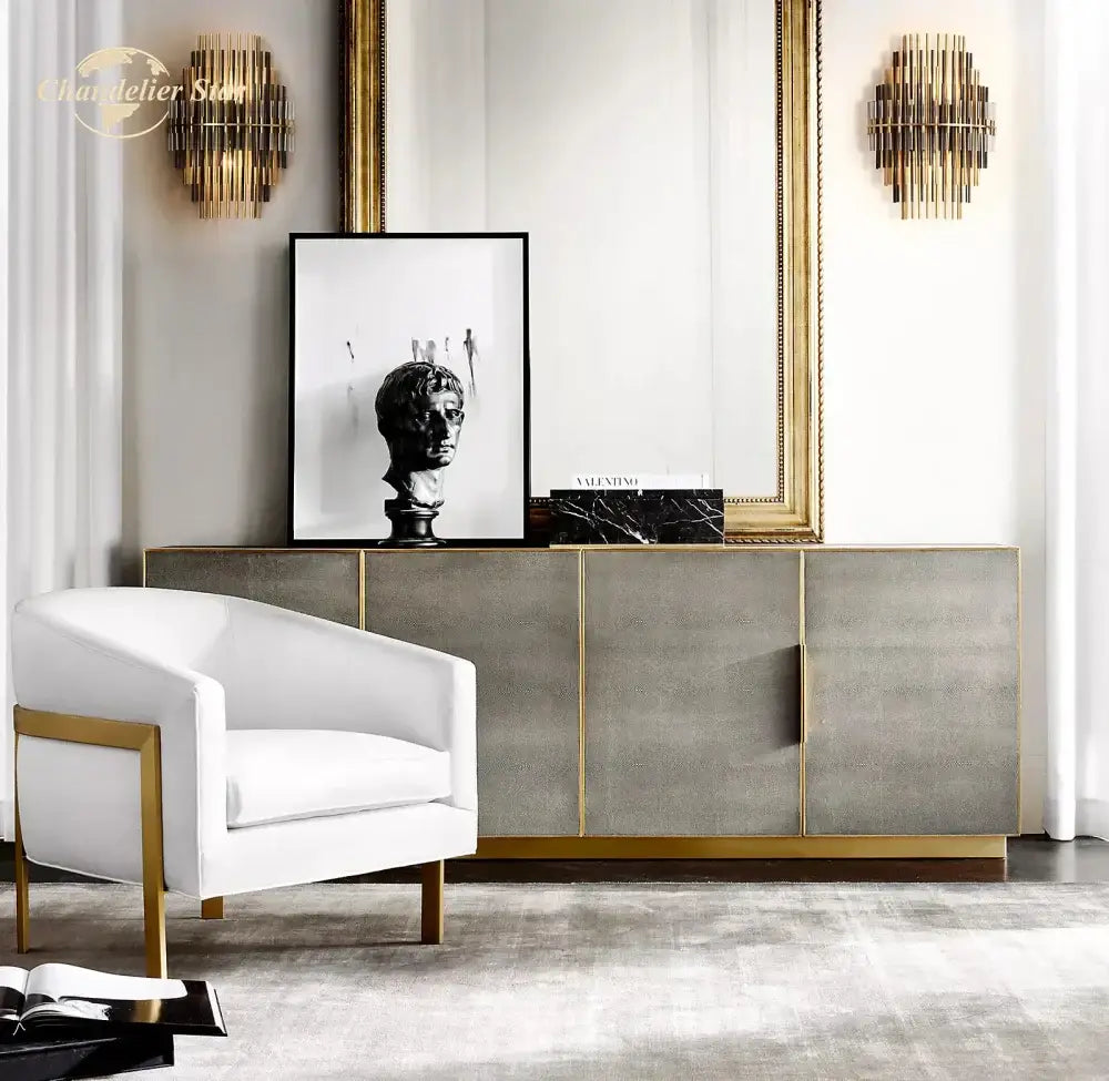 White upholstered armchair with gold-tone metal frame complements decorbites led sconce lamp for bedroom lighting