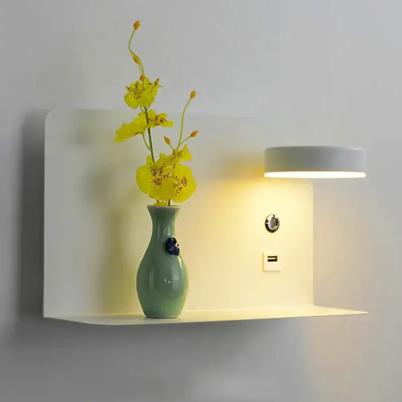 Decorbites led shelf wall lamp in sleek light green ceramic holding yellow orchids with usb charging port and switch