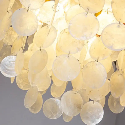 DecorBites led shell chandelier featuring cascading cream seashell discs with modern gold chrome ceiling frame