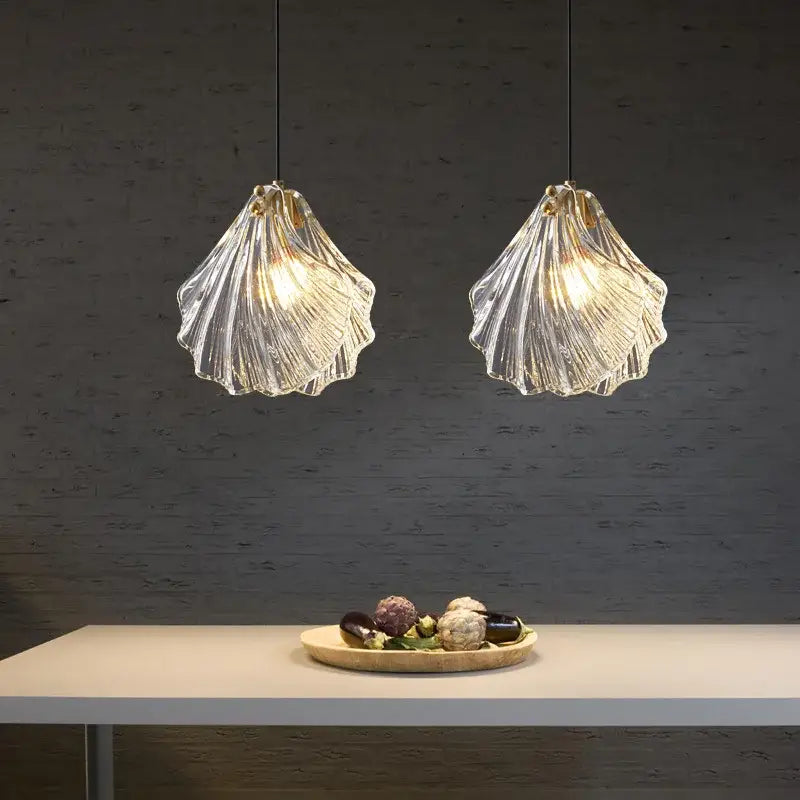 Clear ribbed glass decorbites led shell pendant light with gold metal accents for modern living and dining rooms