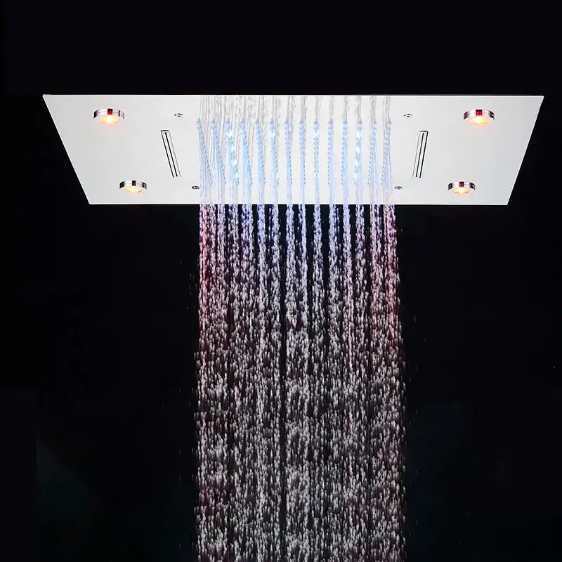 Modern rectangular chrome shower faucet with led lighting casting blue pink and white glow by decorbites led shower