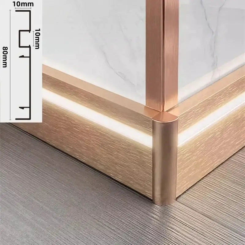 Copper-finished metal corner trim with wood-grain texture and integrated led lighting for led skirting aluminum profiles