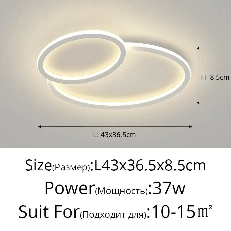 Modern white DecorBites LED smart chandelier with two interlocking oval rings emitting warm glow for bedroom lighting