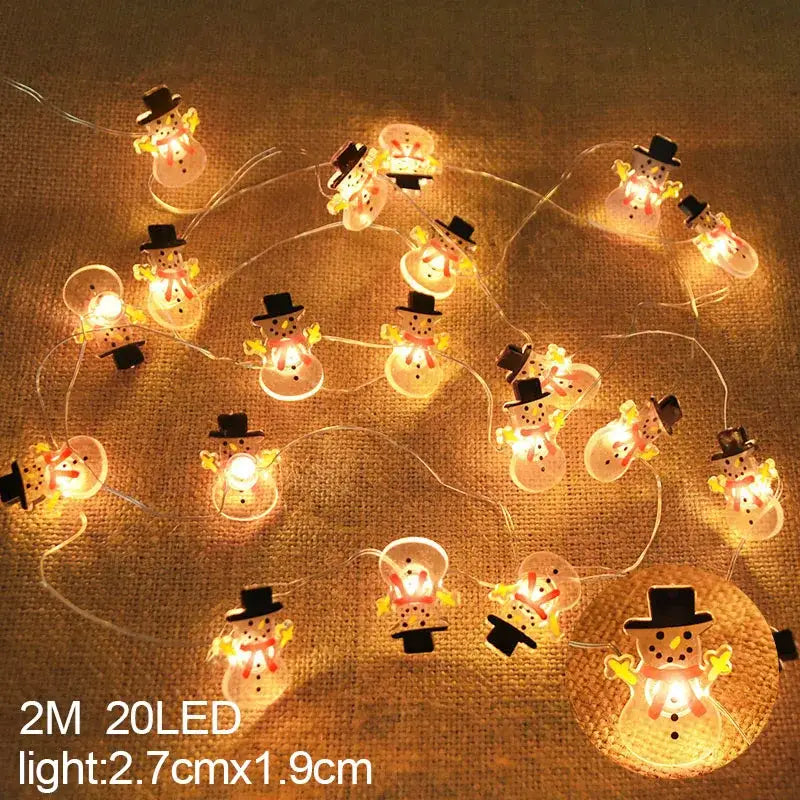 DecorBites™ led snowflake christmas lights featuring illuminated snowmen with black hats and yellow scarves for christmas home decorations