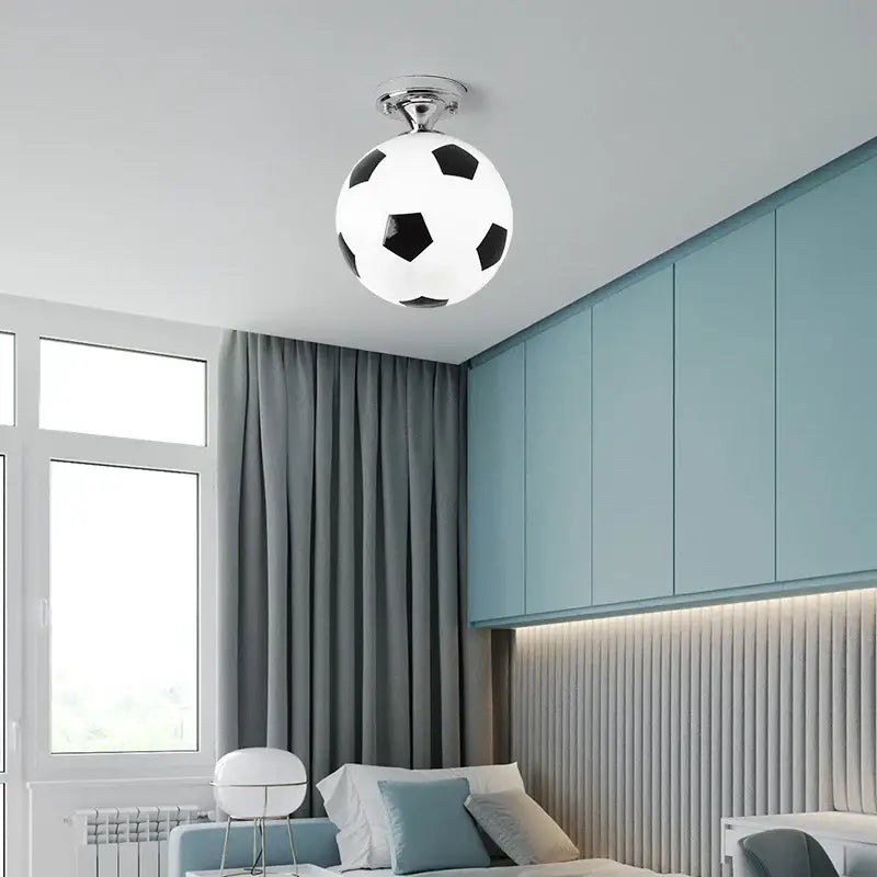 White and black led soccer ball ceiling light with chrome fixture by DecorBites for boys room indoor lighting