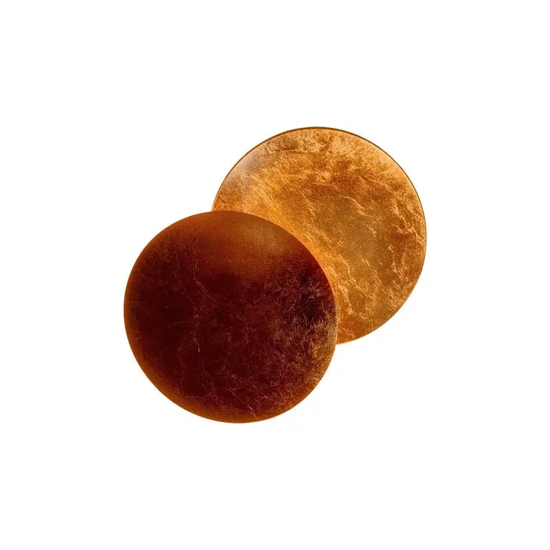 DecorBites led solar eclipse wall lamp features two circular amber and gold metallic discs with textured artisanal design