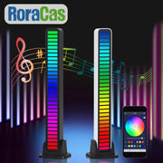 Two sleek decorbites led sound light bars with vibrant rainbow led sound control strips and black bases for decoration