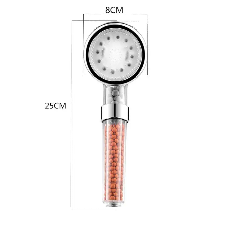 A sleek 25cm decorbites led spa shower head with chrome handle and transparent body filled with orange beads