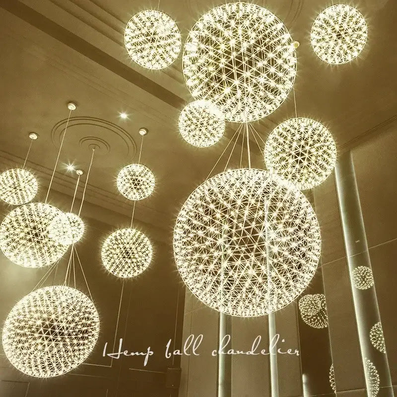 Golden spherical decorbites led spark pendant light with intricate stainless steel wireframe chandelier design