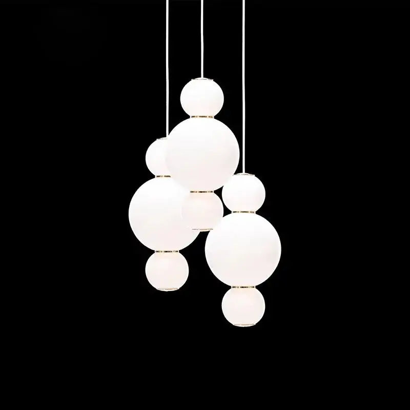 White spherical glass led spiral ball pendant with gold-toned accents from decorbites led spiral for modern decor