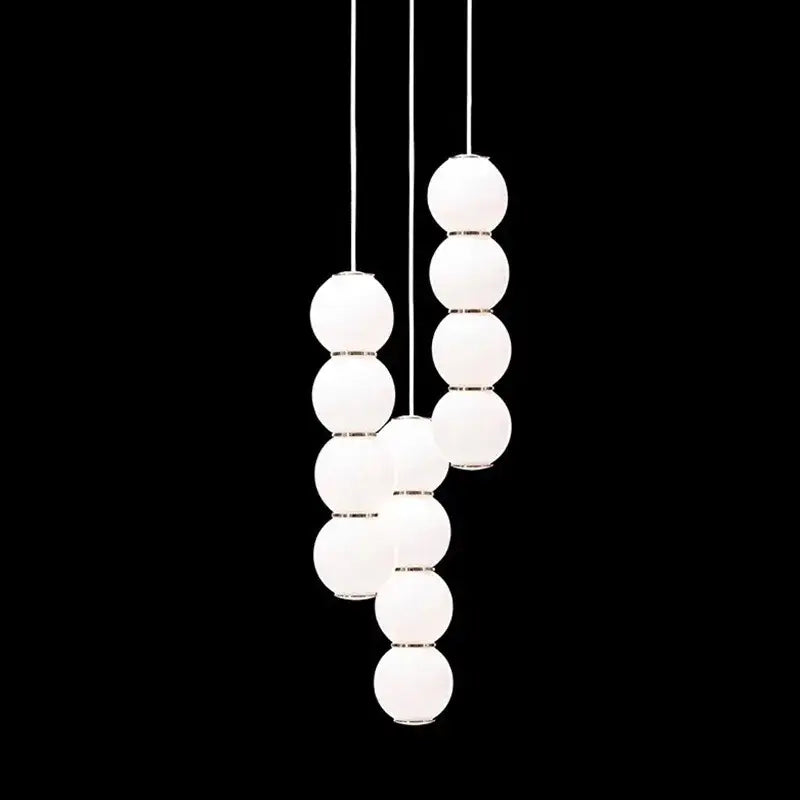 Modern white spherical pendant light featuring a sleek minimalist design in decorbites led spiral ball pendant style