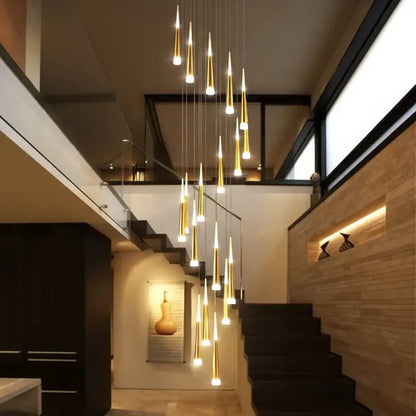 A modern decorbites led spiral chandelier featuring gold-toned pendant lights with tapered glass shades for stairwell lighting