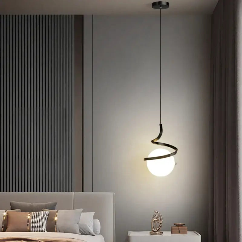 A sleek black decorbites led spiral pendant light chandelier with a glowing white bulb for living room lighting