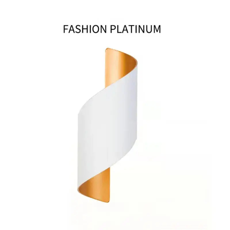 A sleek decorbites led spiral wall light with white exterior and gold lining for outdoor home use