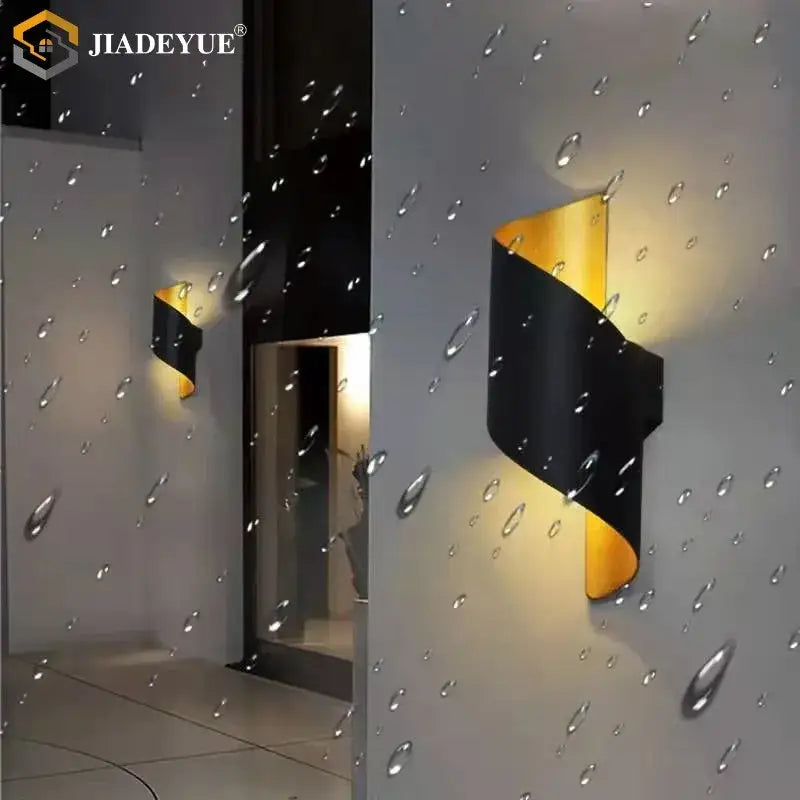 Black and gold twisted decorbites led spiral wall sconce with sleek modern design for outdoor use