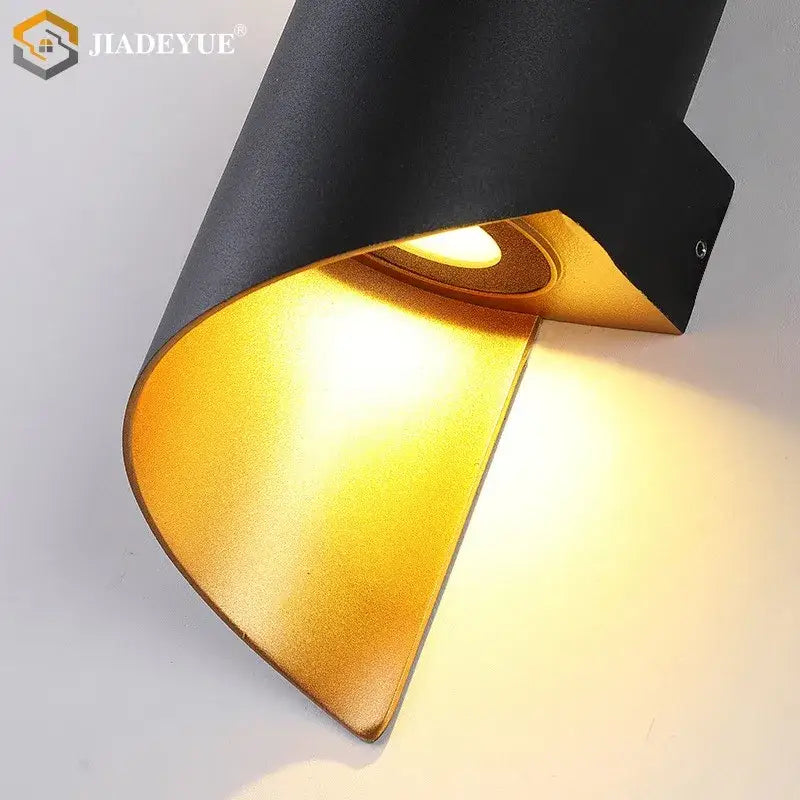 Black and gold modern decorbites led spiral wall sconce with sleek curved design for outdoor home store corridor balcony lighting