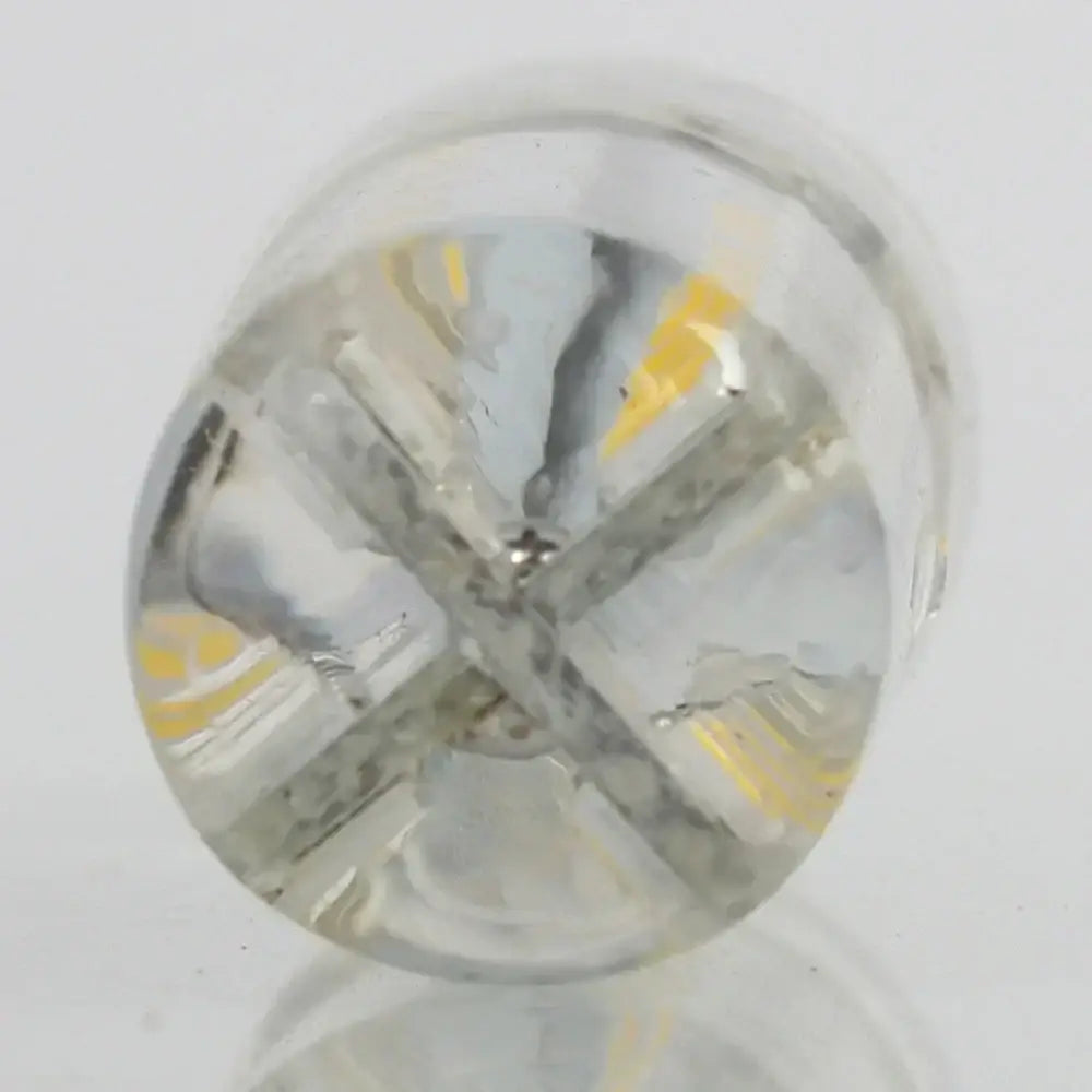 Clear glass DecorBites led spot light bulb with circular faceted design and visible yellow internal LED components