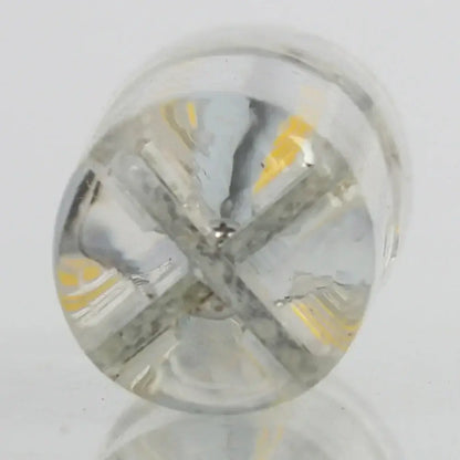 Clear glass DecorBites led spot light bulb with circular faceted design and visible yellow internal LED components