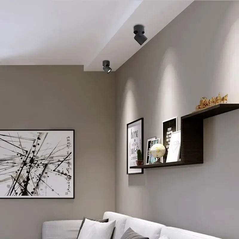 Two black decorbites led spot light cob recessed spotlights with adjustable heads mounted on ceiling for living room