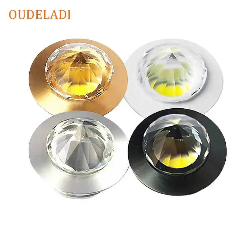 Four diamond-shaped decorbites led spot light fixtures in gold white silver and black for home and jewelry display