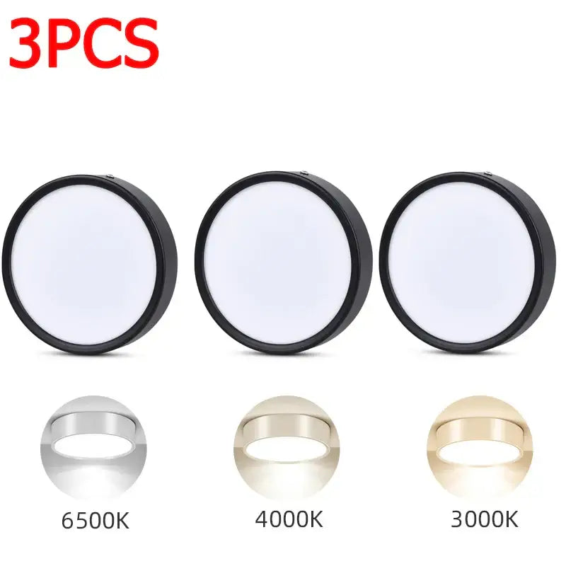 Three circular decorbites led spot lights with black frames in silver gold and bronze finishes for living room lighting
