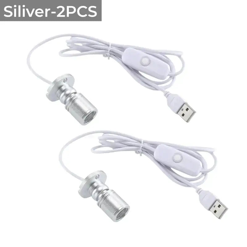 Silver decorbites led spotlight fixtures with white cords and switches for cabinet shelf and ceiling lighting
