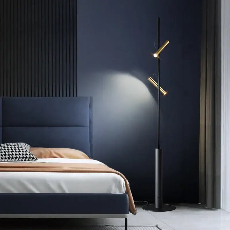 Modern floor lamp with sleek black base and gold arms featuring decorbites led spotlight projection fixtures