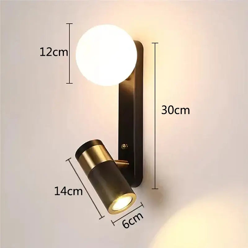 Modern decorbites led spotlight wall lamp with matte black backplate, white globe, and brass spotlight for bedroom use