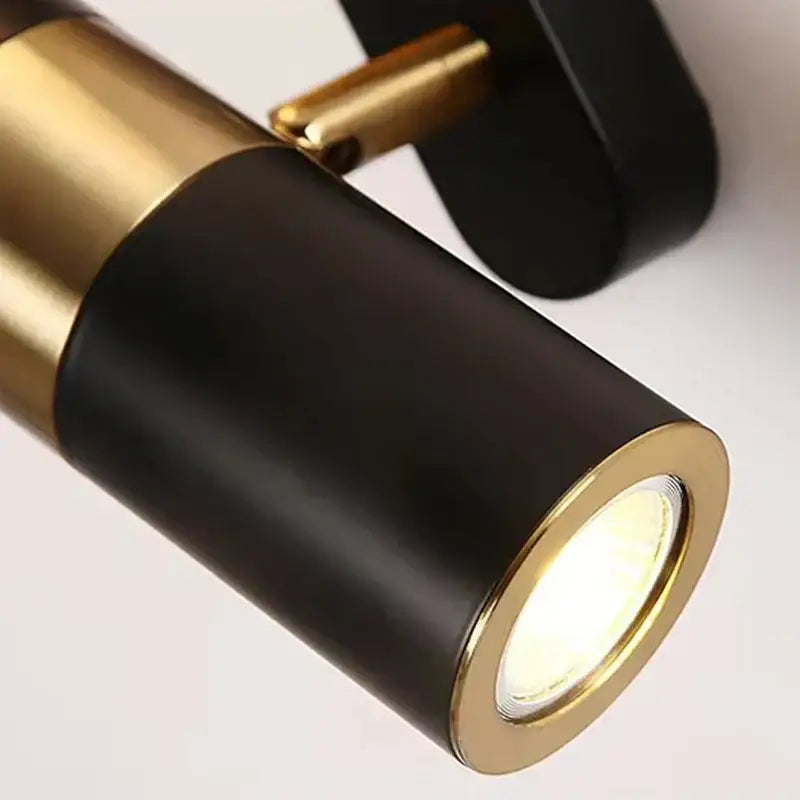 Decorbites led spotlight wall lamp in black and gold with cylindrical design for bedside bedroom and living room decor
