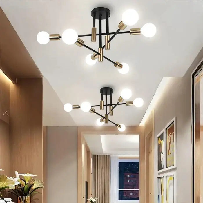 Modern black and brass DecorBites LED Sputnik chandelier with spherical white bulbs ceiling light for bedroom and living room