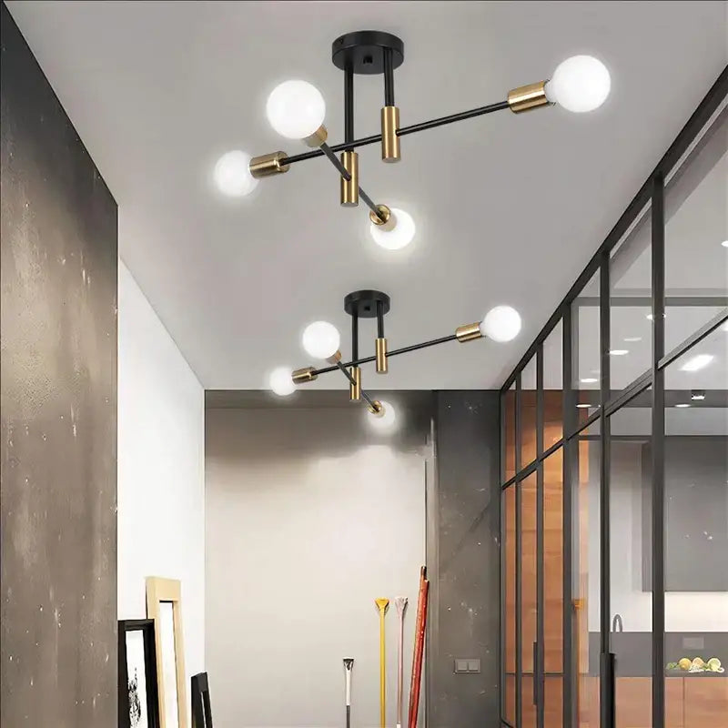 Modern black and gold DecorBites LED Sputnik ceiling light with multiple spherical white bulbs for bedroom and living room