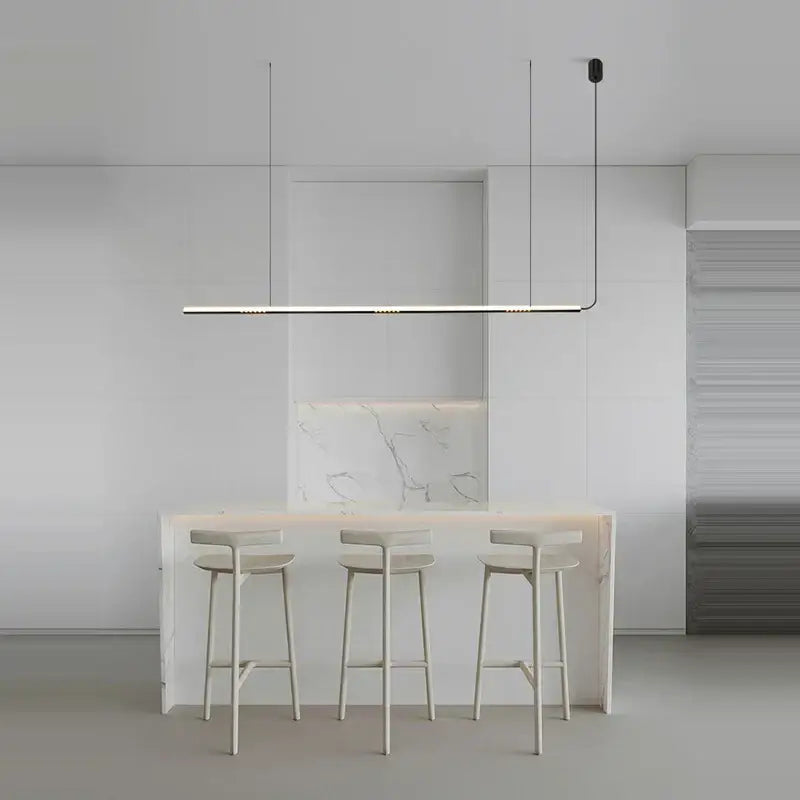 Minimalist decorbites led square sensor chandelier with sleek black finish and thin cables above white kitchen island