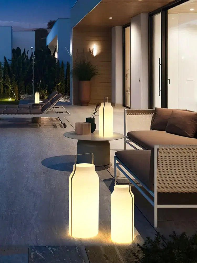 Warmly glowing decorbites led stainless steel outdoor lawn light with sleek cylindrical design and soft white led light