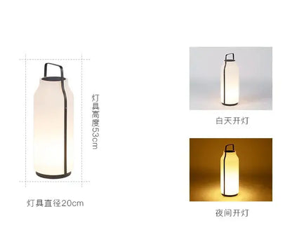 A sleek decorbites led stainless lawn light with frosted glass body and black metal frame for outdoor use