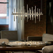 Modern silver-toned DecorBites™ LED stainless steel pendant light chandelier with geometric vertical rods for home decor