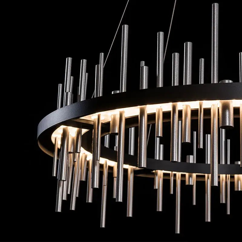 Modern pendant light chandelier featuring black frame and stainless steel rods with warm light by DecorBites led stainless
