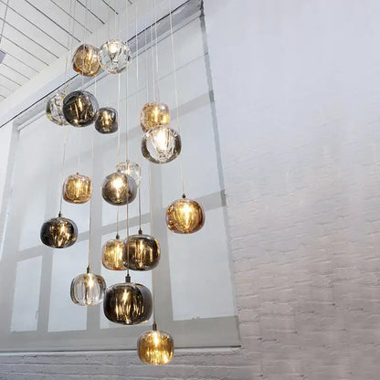 DecorBites LED stair chandelier with cascading spherical glass orbs in gold silver and clear finishes for indoor use