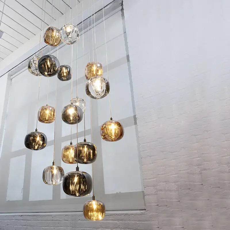 DecorBites LED stair chandelier with cascading spherical glass orbs in gold silver and clear finishes for indoor use