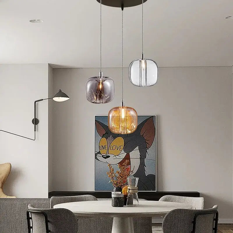 Three modern glass pendant lights with frosted and clear shades in decorbites led stair chandelier amber crystal design