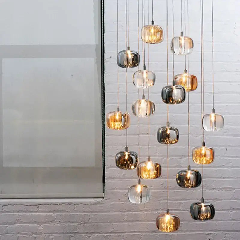 Modern decorbites led stair chandelier with amber crystal and mirrored glass globes suspended by metallic cords