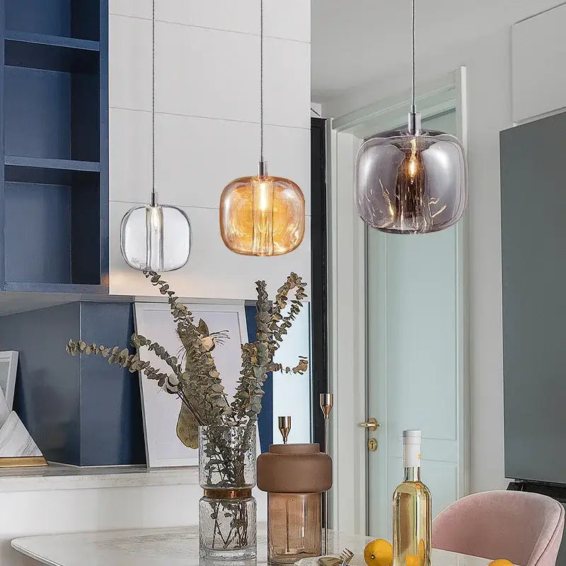 DecorBites LED stair chandelier with three amber and smoky gray frosted glass pendant lights and metallic fixtures
