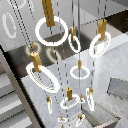 Modern minimalist decorbites led stair chandelier with glowing white rings and gold fixtures for nordic living rooms