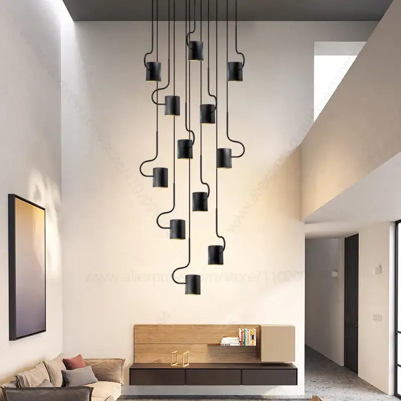 Black cylindrical decorbites led staircase chandelier with curved metal arms for modern villa lighting interior