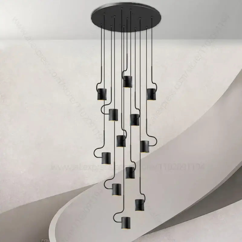 Black decorbites led staircase chandelier with sleek curved metal arms and cylindrical lights for modern villa decor