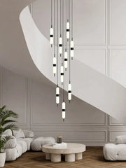 Modern minimalist decorbites led staircase chandelier with white and black cylindrical bulbs suspended by thin cords
