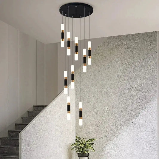 Modern black and gold cylindrical led staircase chandelier hanging from a circular ceiling fixture for duplex homes