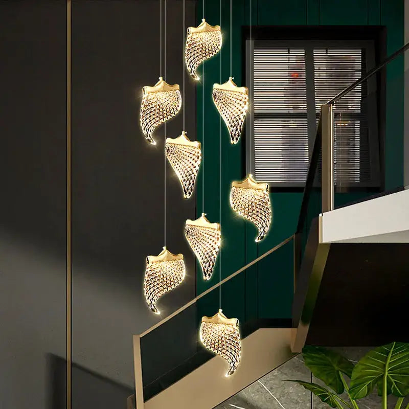 Golden shell-shaped decorbites led staircase chandelier with crystal detailing for modern living and dining rooms