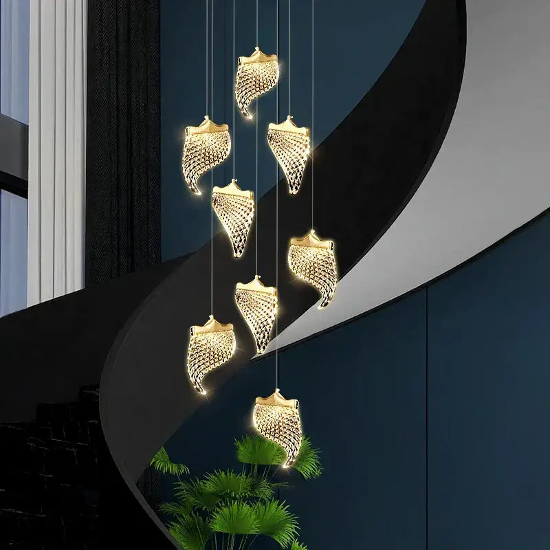 Golden shell-shaped decorbites led staircase chandelier with intricate mesh detailing for living and dining rooms