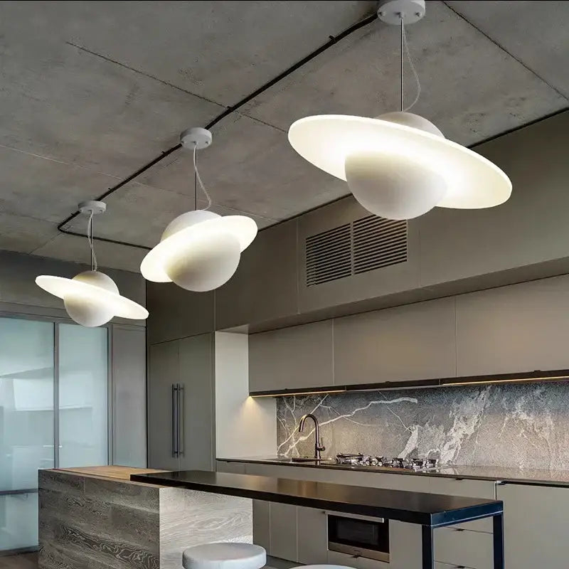 Modern white planet-themed decorbites led staircase chandelier with matte finish and glowing illumination for living room decor