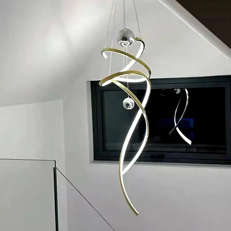 Modern DecorBites LED staircase pendant light with sleek gold and silver metallic bands and soft white LED lighting